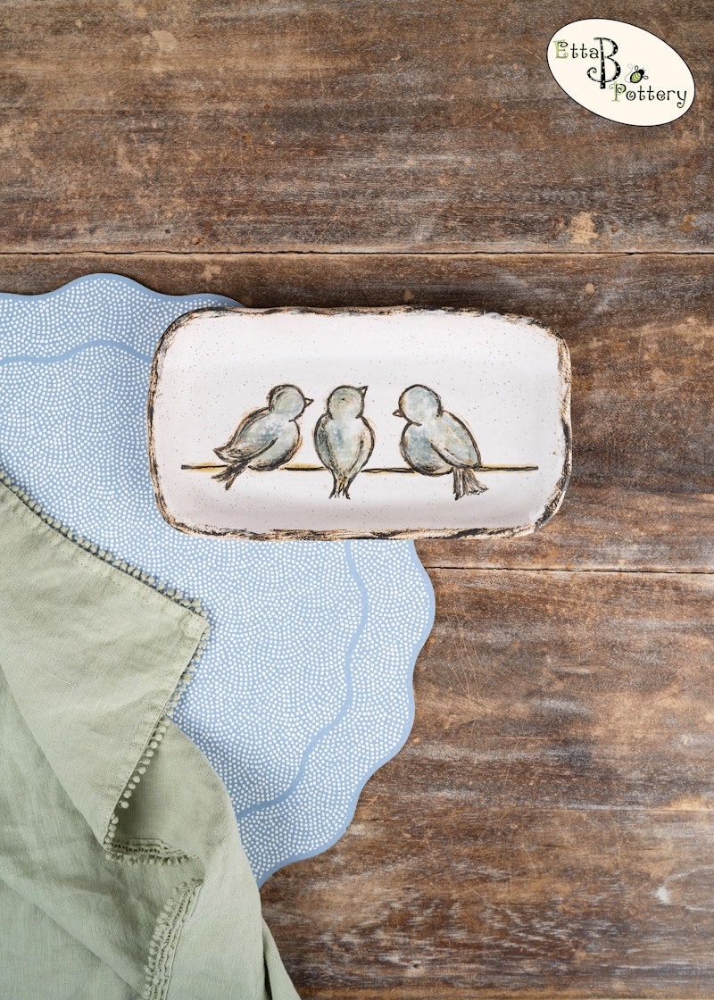 Birdies on a wire platter